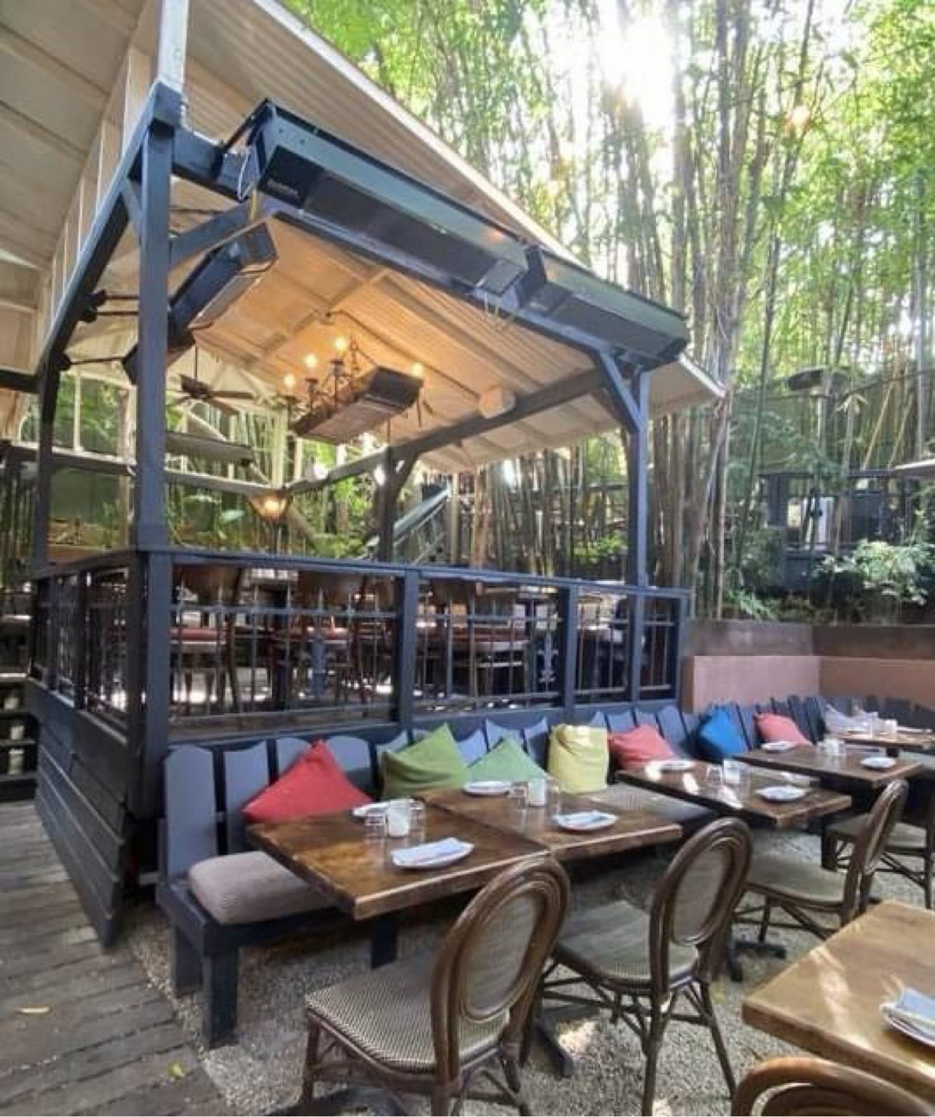 Sunpak wall-mount heaters installed across a restaurant patio
