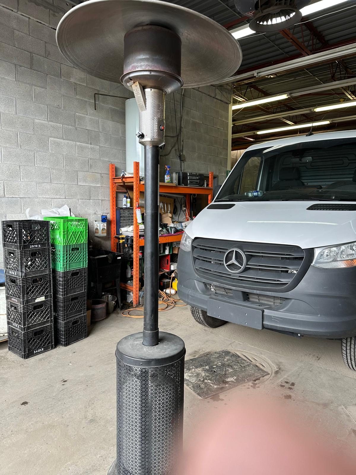 Service van alongside a commercial patio heater from our fleet